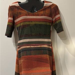 Mini dress used for fall stretchy material, Great condition, Vibrant colors,